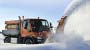 Truck cleaning road - iStock 156957253